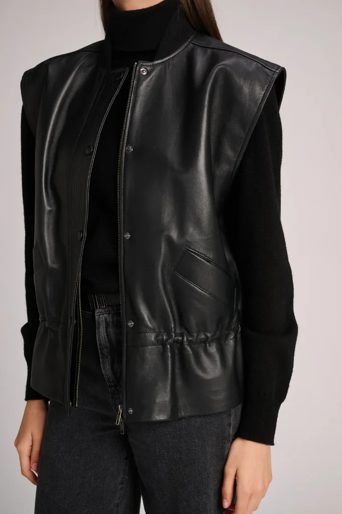 vest_antwerp_black_leather_Pull_anna_black_trousers_mumbai_darkgrey_march23_4.webp
