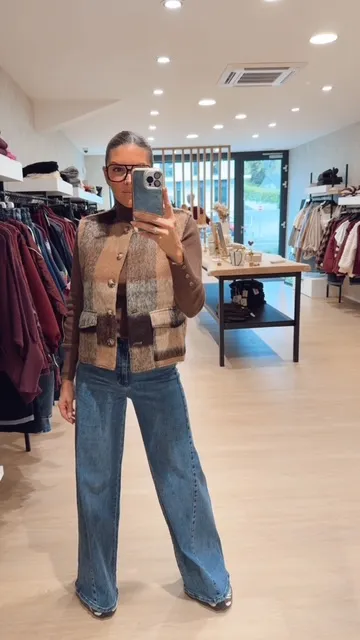 Gilet s/manche à carreaux